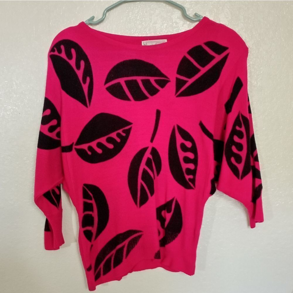 Bright pink 80s sweater